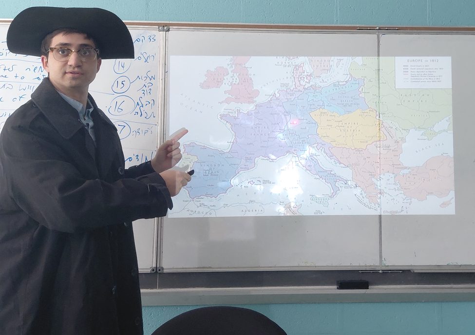 Mr. Dear taught the ninth graders about the Napoleonic Wars while in character as Napoleon.